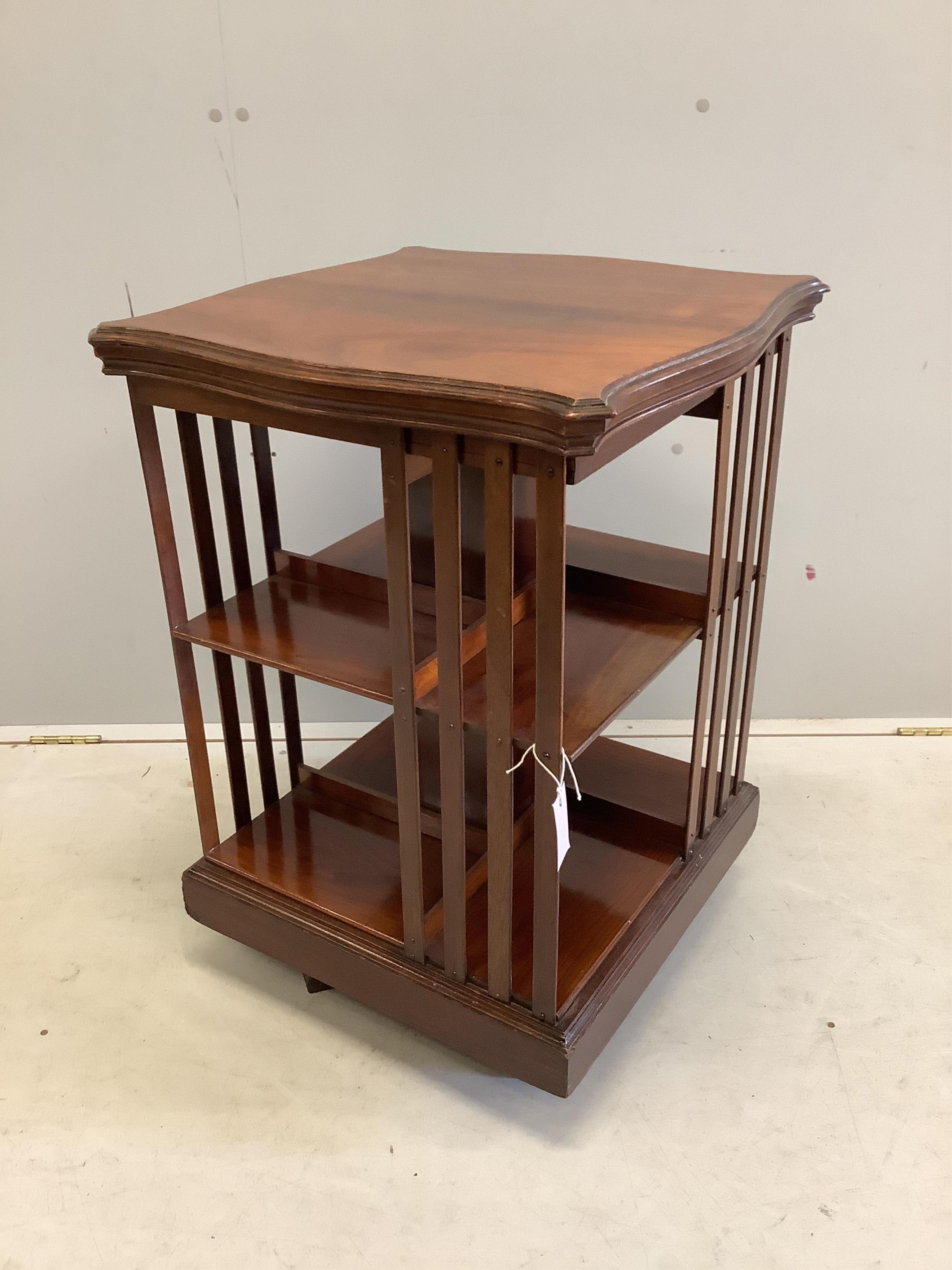 An Edwardian mahogany revolving bookcase, width 53cm, depth 53cm, height 76cm